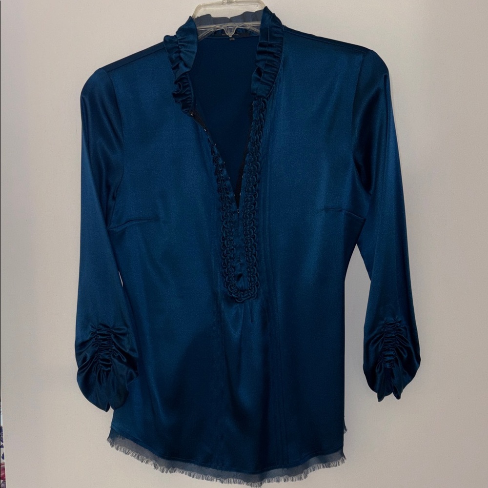 Elegant Blue Elie Tahari blouse.